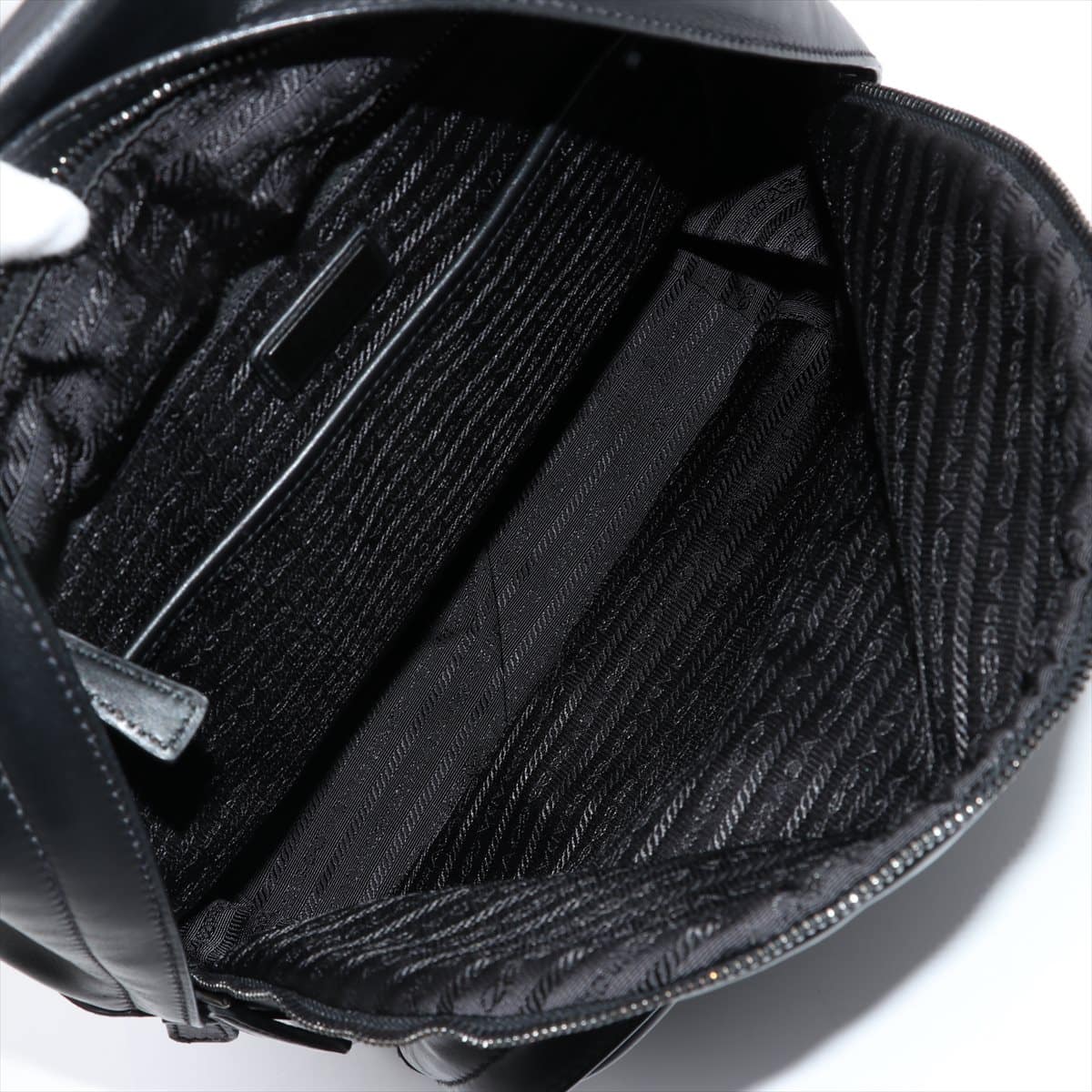 Prada Leather Backpack Black 2VZ066 Cracked leather edge paint