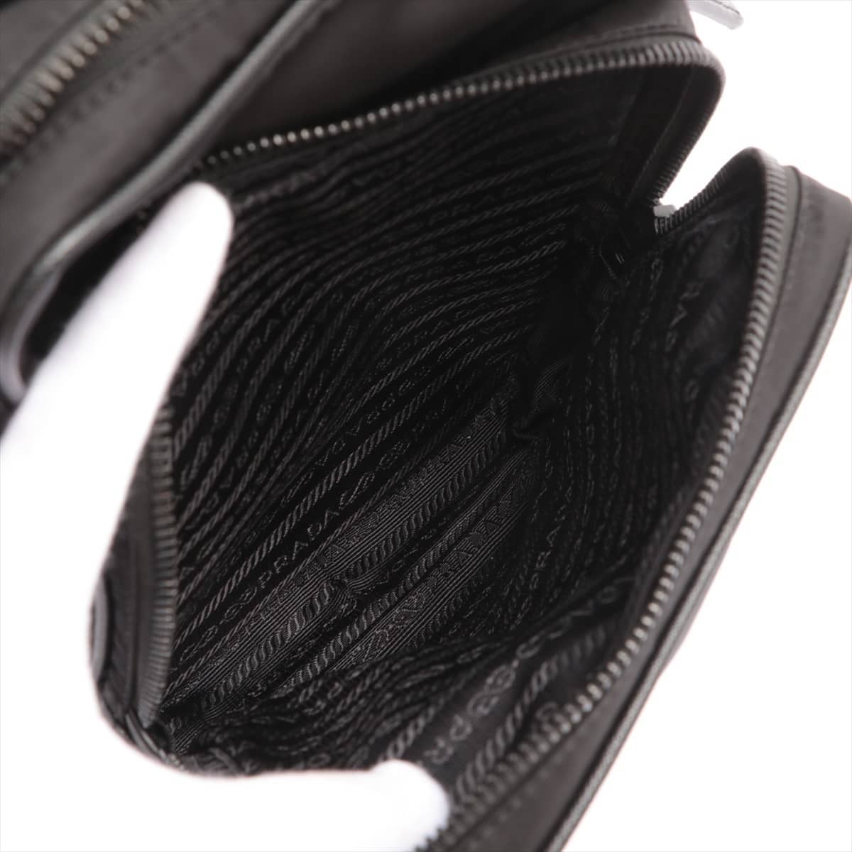 Prada Saffiano Tessuto Sling backpack Black 2VZ026