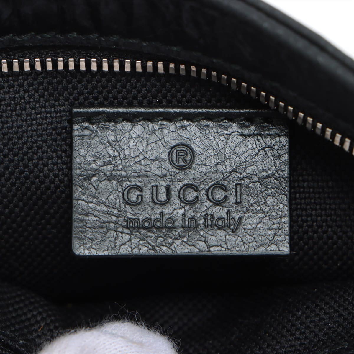 Gucci Interlocking G Leather Sling backpack Black 575857