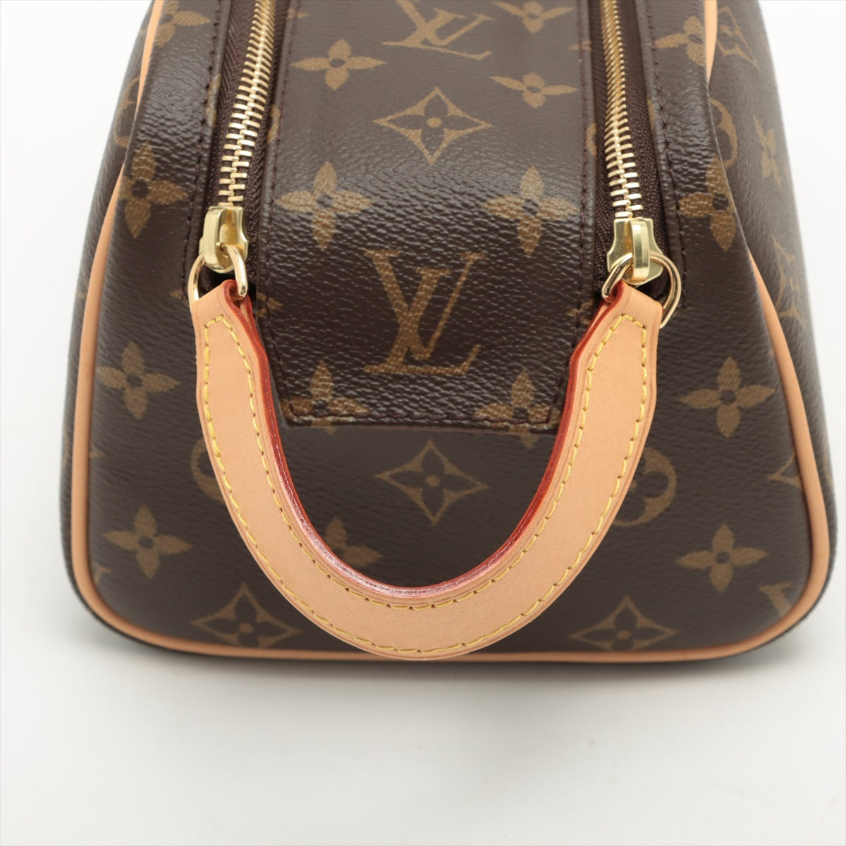 Louis Vuitton Monogram Dopp kit M44494 The back of the flap is peeled off